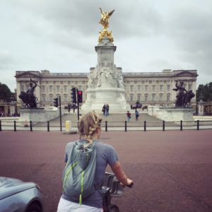On a Santander Bike in front of Buckingham Palace